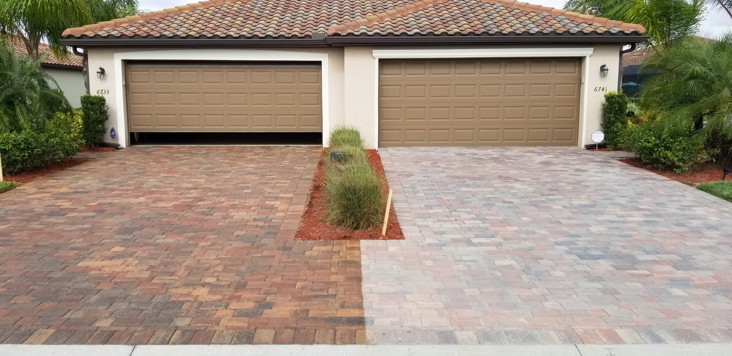 House with a paver driveway