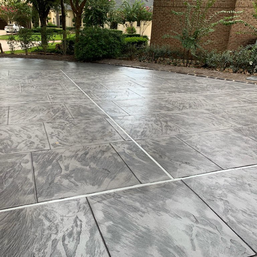 Treated stamped concrete driveway