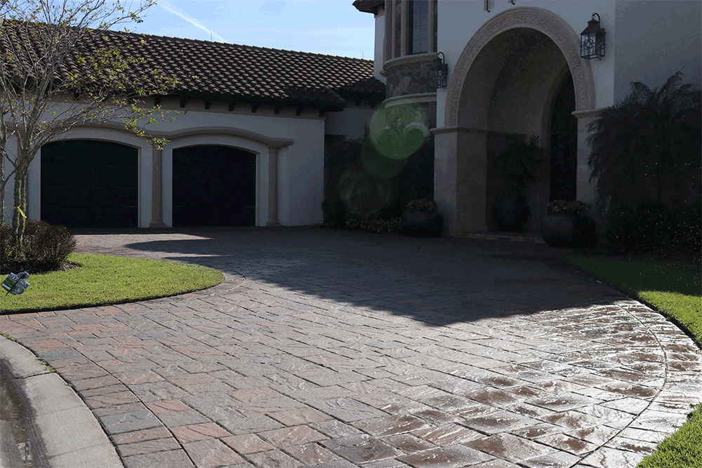 House with paver driveway